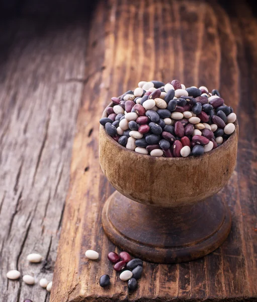 Different types of beans in the bowls Stock Obrázky