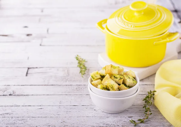 Crunchy homemade croutons with herbs and butter — Stock Photo, Image