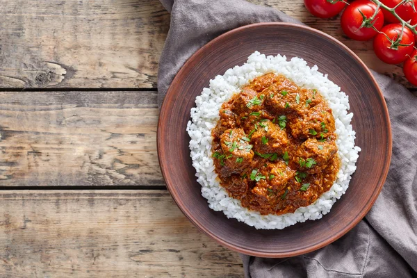 Traditional Madras butter Beef spicy garam masala slow cook lamb food with rice — Stock Photo, Image