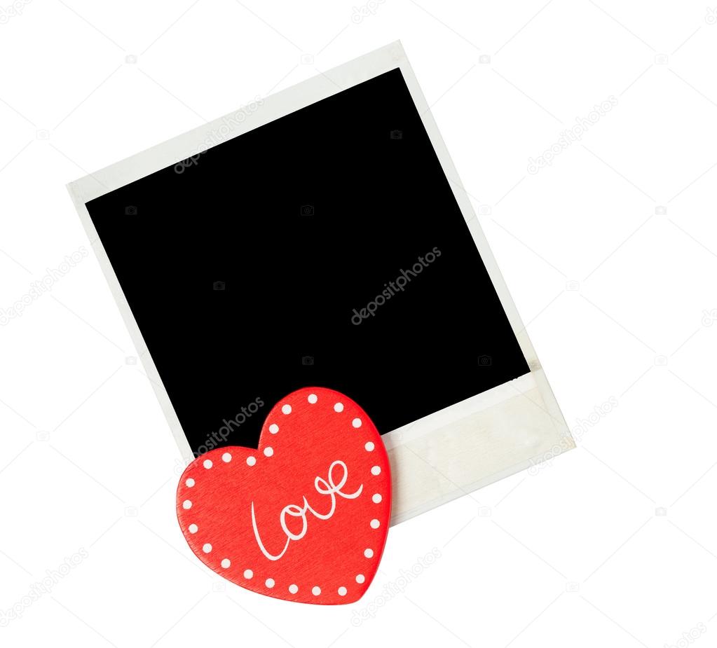 Empty polaroid photo frame with heart  for valentines day on iso