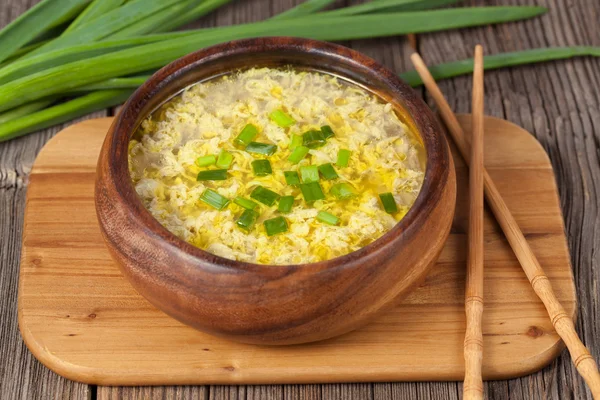 Bowl of traditional chinese yellow drop egg soup with broth — Stock Image Bowl of traditional chinese yellow drop egg soup with broth Royalty Free Stock Photos