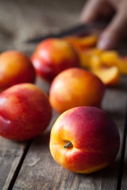 Peaches healthy vegetarian nutrition food on vintage wooden background