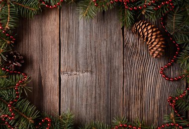 Christmas composion frame with empty space for design text new year tree decorations on vintage wooden table background.