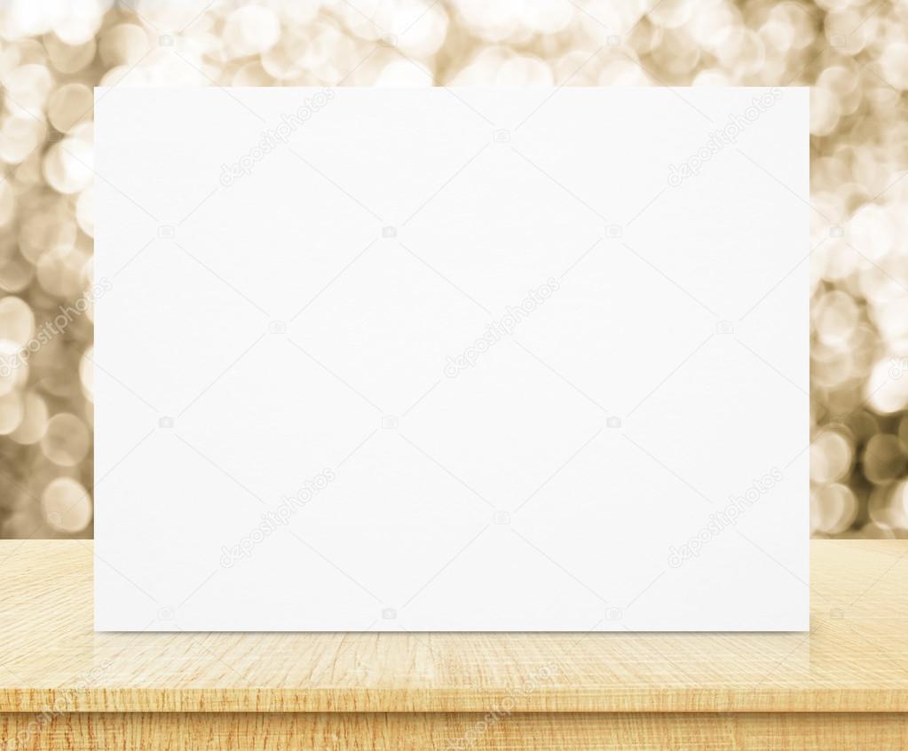 gold bokeh wall and wooden table