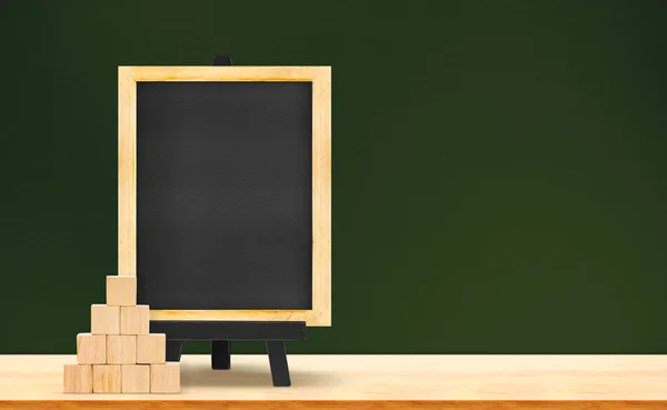 Blackboard and wood cubes — Stock Photo, Image