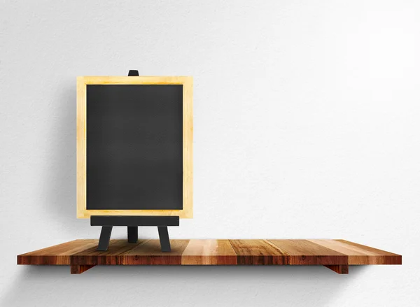 Empty blackboard on wooden shelf — Stock Photo, Image