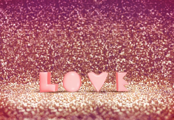 Glanzende roze kleur liefde woord — Stockfoto