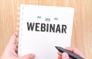 Beyaz bağlayıcı not defterinde Websemineri sözcüğü 