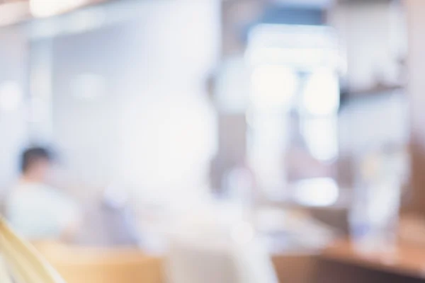 Gente en restaurante con bokeh — Foto de Stock