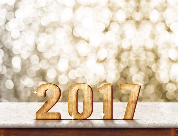 2017 year wood texture on marble table top with golden sparkling — Stock Photo, Image