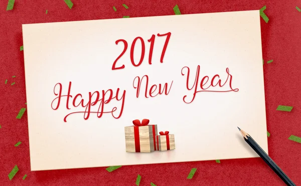 2017 Happy new year word on old vintage paper craft with present