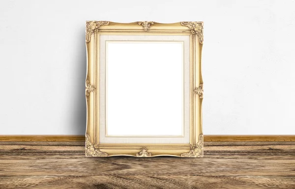 Lege gouden Vintage Picture Frame leunend op rustieke houten FLOO — Stockfoto