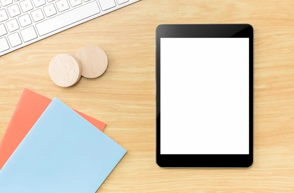 Top view of Empty screen tablet with blue notebook and keyboard — Stock Photo, Image