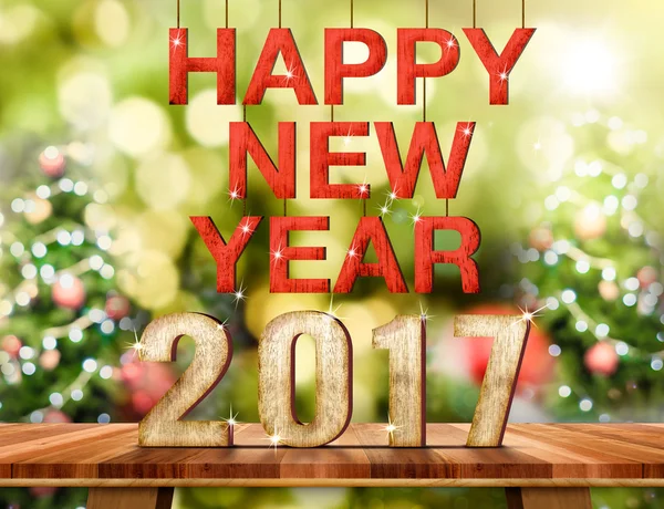 Número feliz año nuevo 2017 en la mesa de madera marrón con resumen — Foto de Stock