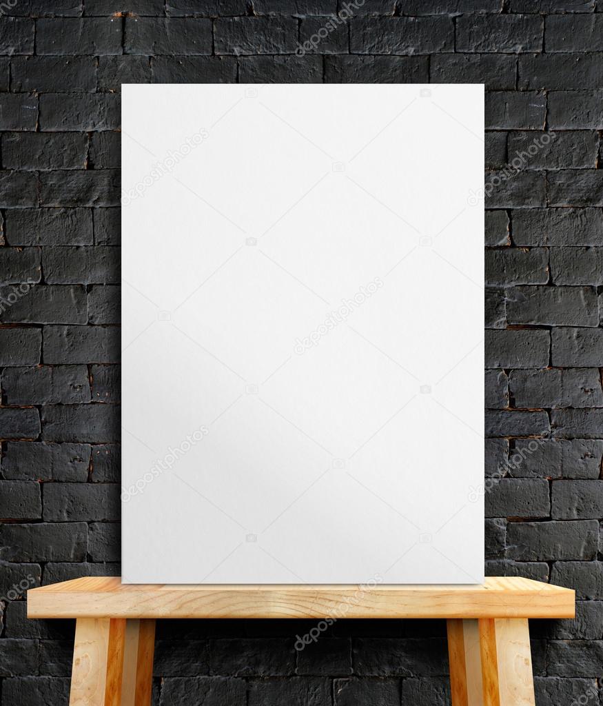 Blank White paper poster on wood table at black stone wall,Templ