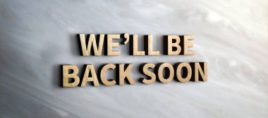 we will be back soon wood sign on marble wall.business under construction concept.3d rendering text