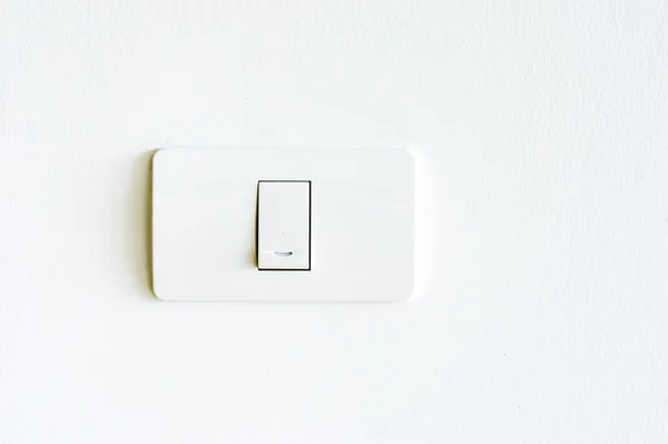 Interruptor de iluminación en pared blanca — Foto de Stock