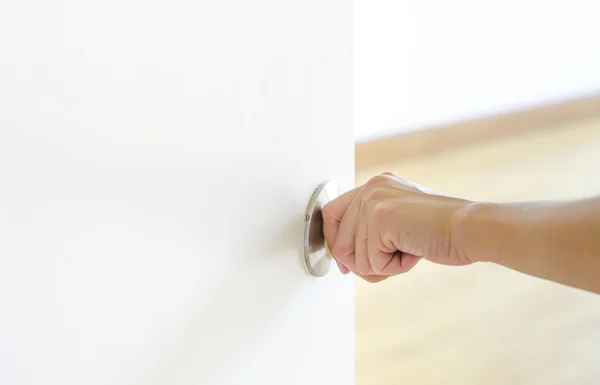 Hand opening door knob,white door — Stock Photo, Image