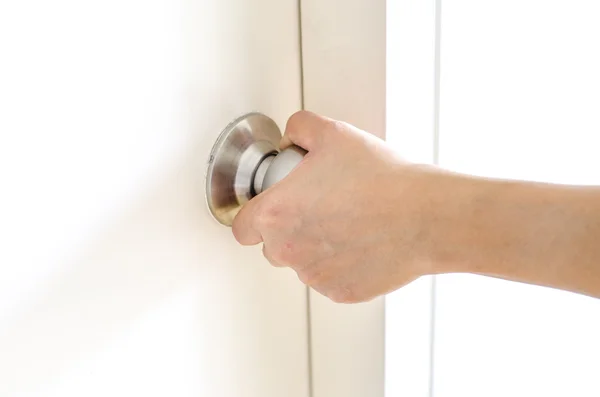 Hand opening door knob,white door — Stock Photo, Image