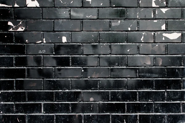 Grunge black brick wall texture — стоковое фото