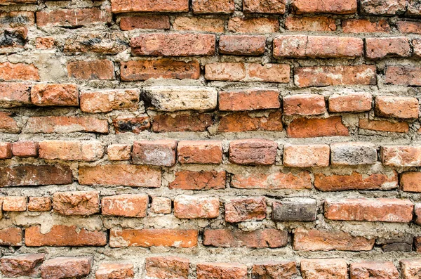 Cracked concrete vintage brick wall background — Stock Photo, Image