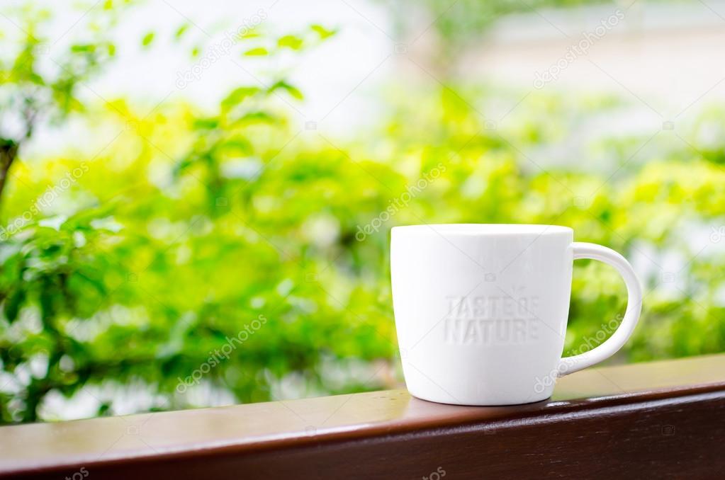 White ceramic mug with stamp word 