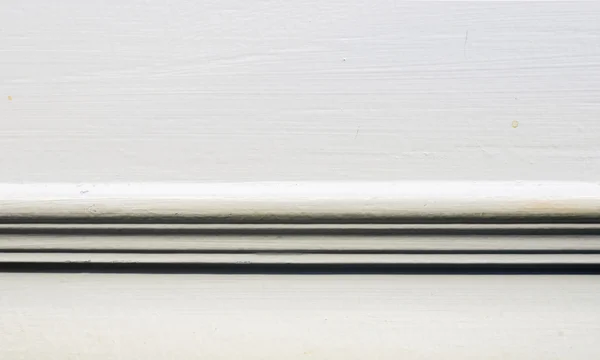 Zeď s baseboard lištou, — Stock fotografie