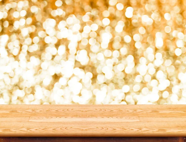 Mesa de madera con fondo dorado bokeh , — Foto de Stock