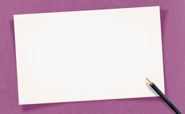 Tarjeta blanca en blanco con lápiz — Foto de Stock