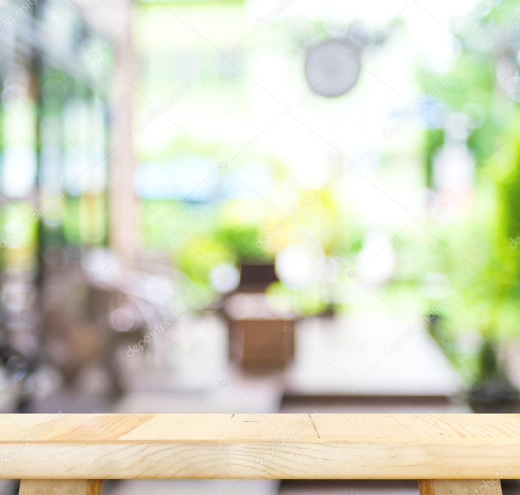 wood table and blurred cafe