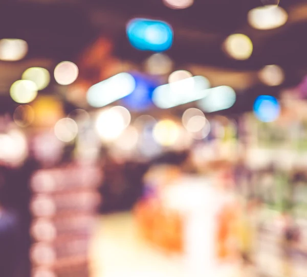 Supermercado tienda borroso fondo con boke — Foto de Stock