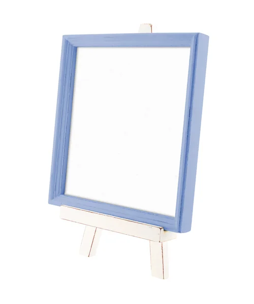 Land rustiek houten frame met witte houten ezel geïsoleerde o — Stockfoto