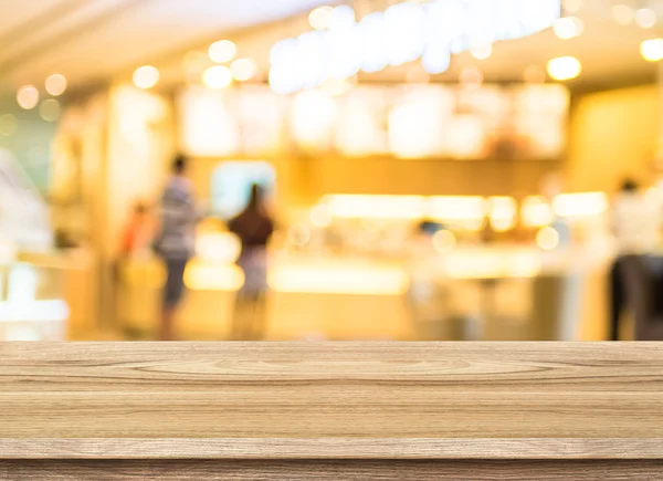 Empty wood table top with coffee shop — 스톡 사진