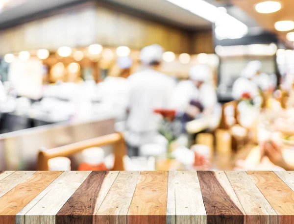 Mesa e restaurante desfocado — Fotografia de Stock