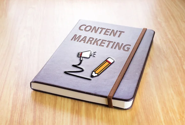 Bruna anteckningsbok med Content marketing — Stockfoto