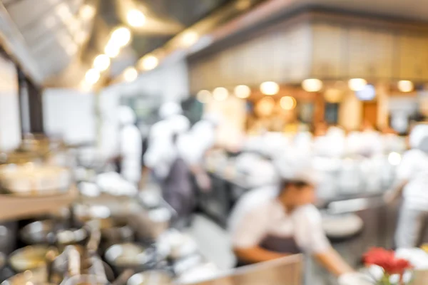 Groups of Chef cooking in the open kitchen