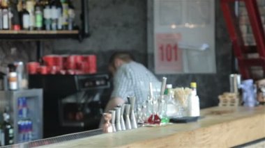 Man orders beer at the bar