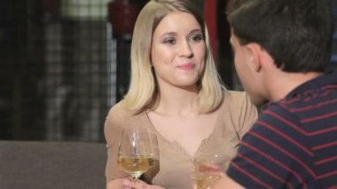 Man and woman have a pleasant conversation at the restaurant