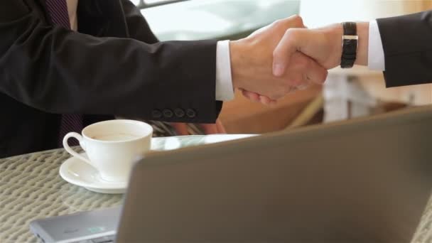 Close up shaking hands in a restaurant — Stock Video