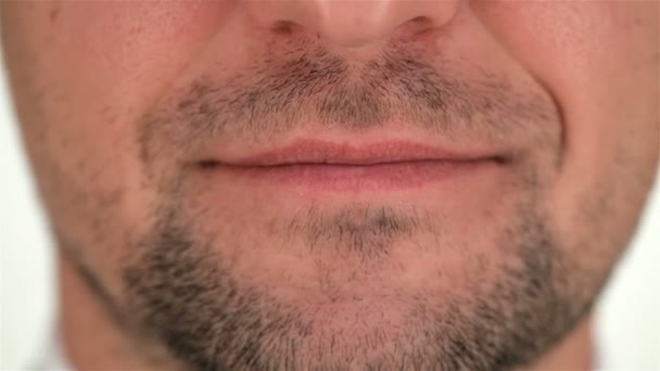 Part of the human unshaven face and smile — Stock Video