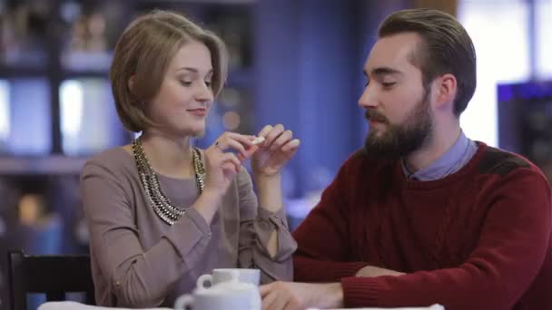 Woman at the cafe with her boyfriend — Stock video