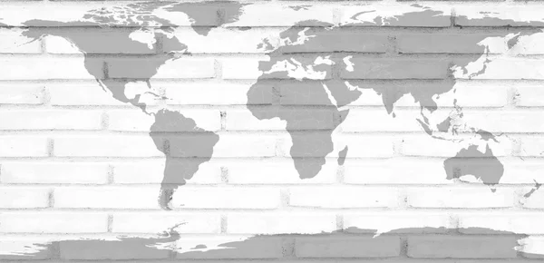 World map on brick white wall background — Stock Photo, Image