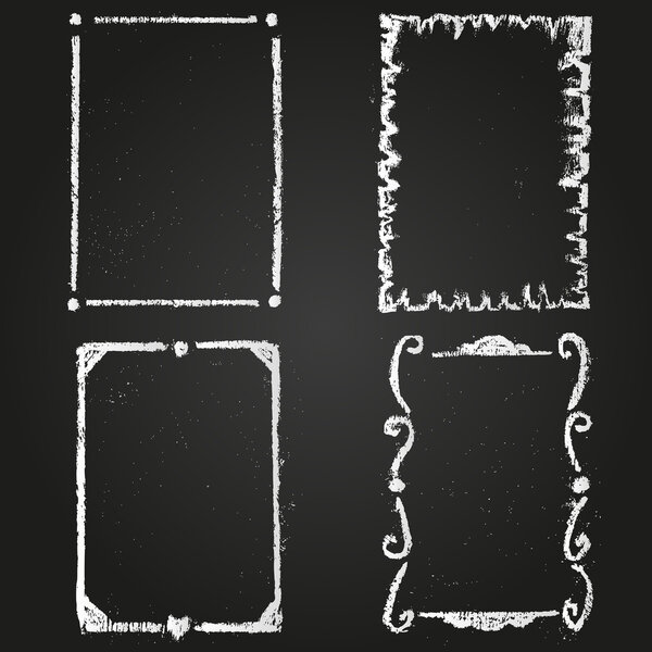 Set of chalk painted frames on a black chalkboard.