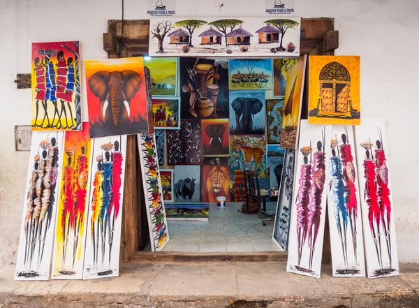 Local store selling colorful tingatinga paintings — Stock Photo, Image