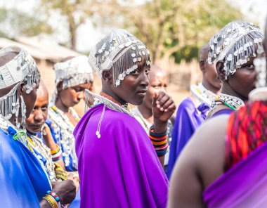 Maasai women dancing and singing clipart