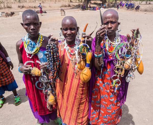 Maasai women offering souvenirs