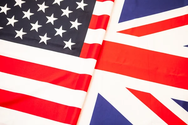 Flags of USA and United Kingdom. Two state flag folded in half. — Stock Photo, Image