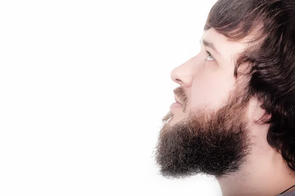 Barba es su estilo. Perfil de primer plano del hombre barbudo de pie sobre fondo blanco sin emociones, solo calma . — Foto de Stock