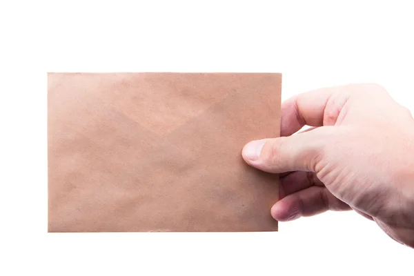 Enveloppes de maintien de la main avec des lettres sur le fond blanc isol — Photo