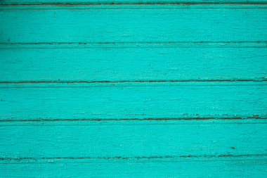 Arka plan eski ahşap plakalar kırık boya ile boyanmış.